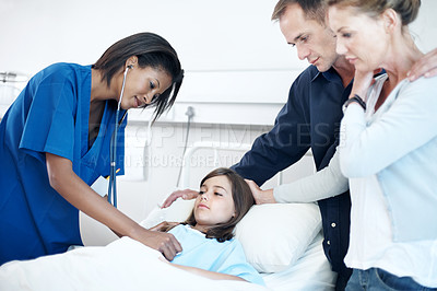 Buy stock photo Nurse, parents and stethoscope in hospital with kid, breathing and heartbeat for diagnosis. Family, pediatrician and listening to lung sounds with child, medical assessment and healthcare treatment
