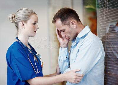 Buy stock photo Nurse, comfort and console sad man in hospital with empathy, compassion or assurance for recovery. Healthcare worker, worried person and help in clinic with stress, support or understanding emotions