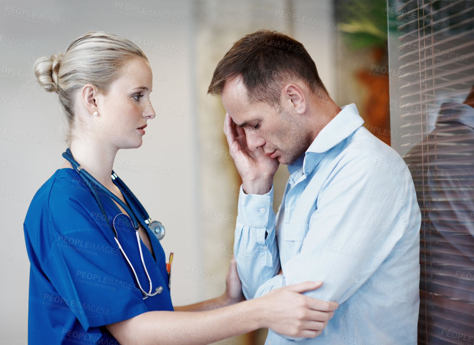 Buy stock photo Nurse, comfort and console sad man in hospital with empathy, compassion or assurance for recovery. Healthcare worker, worried person and help in clinic with stress, support or understanding emotions