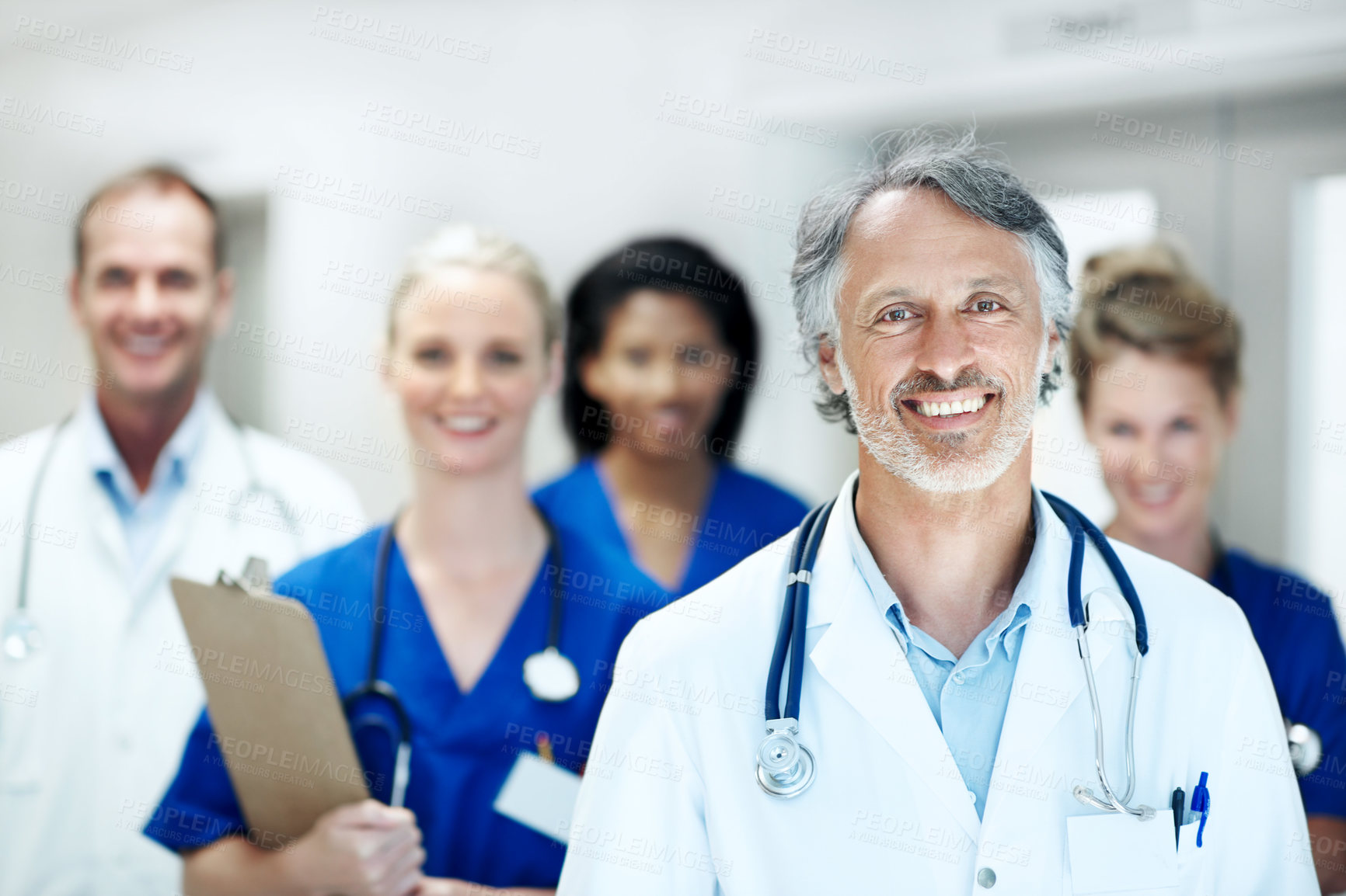 Buy stock photo Team, portrait and happy with doctors in hospital for healthcare, solidarity and consulting. Medical, nurses and about us with people in hallway of clinic for support, community and collaboration