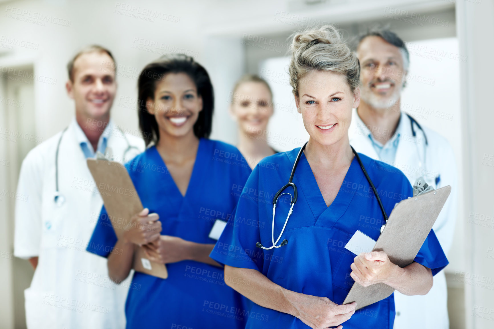 Buy stock photo Team, portrait and nurses with doctors in hospital for healthcare, solidarity and consulting. Medical, meeting and about us with people in hallway of clinic for support, community and collaboration