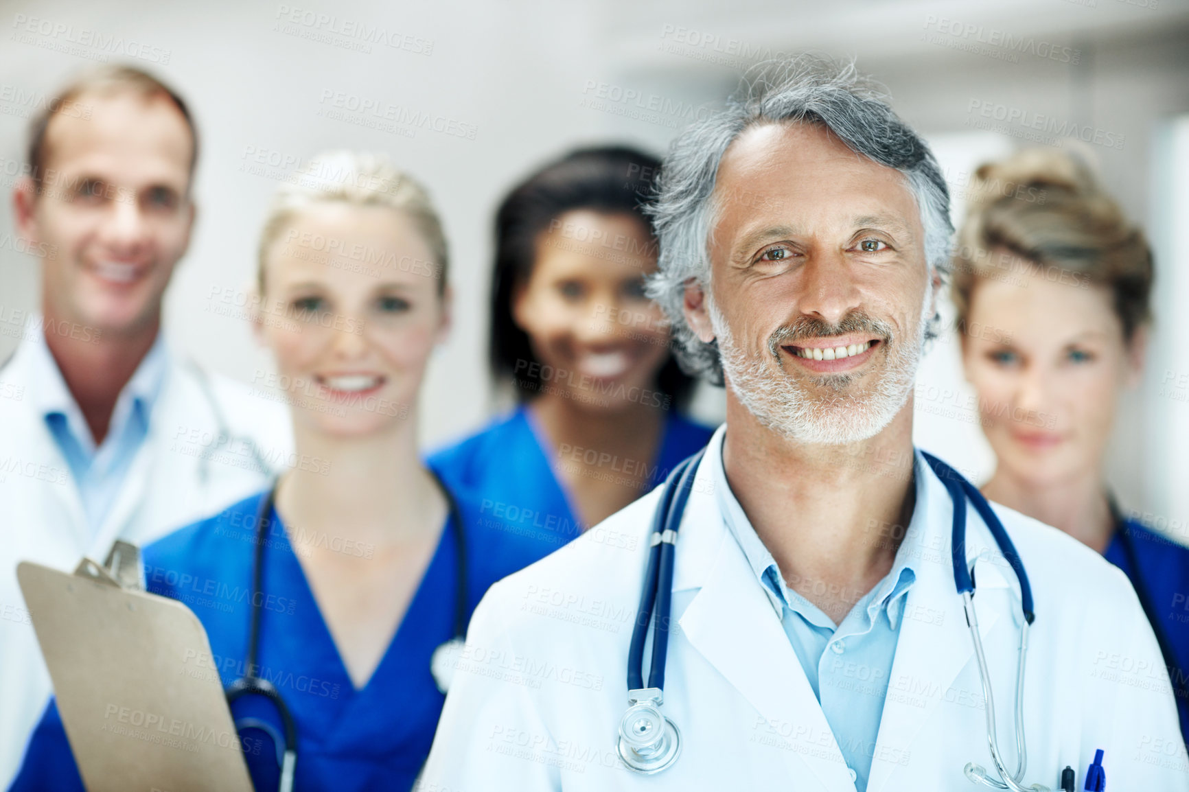 Buy stock photo Team, portrait and leader with doctors in hospital for healthcare, solidarity and consulting. Medical, nurses and about us with people in hallway of clinic for support, community and collaboration