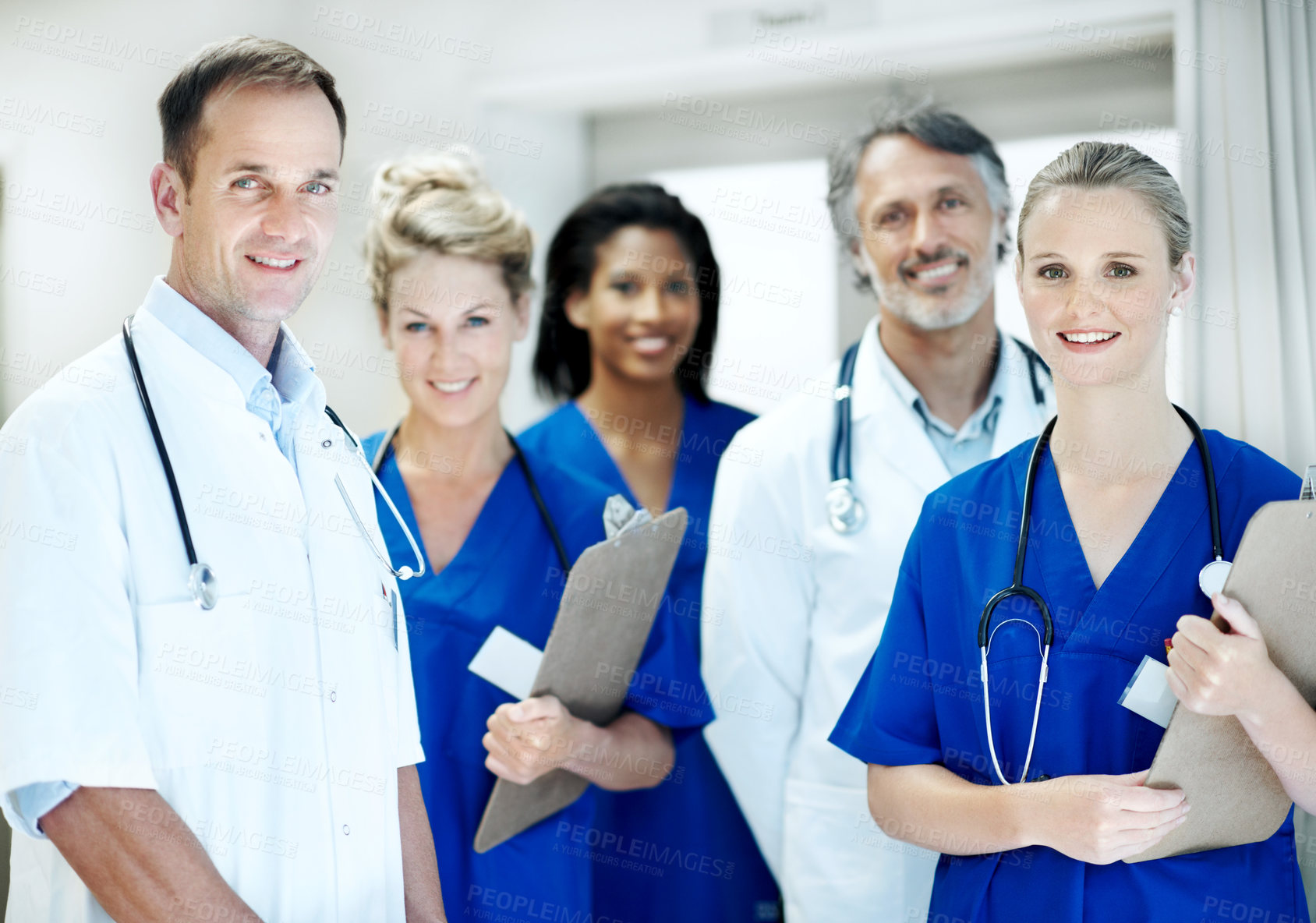 Buy stock photo Team, portrait and meeting with doctors in hospital for healthcare, solidarity and consulting. Medical, nurses and about us with group of people in hallway of clinic for support and collaboration