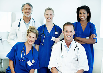 Buy stock photo Team, portrait and happy with doctors in hospital for healthcare, solidarity and consulting. Medical, nurses and about us with group of people in hallway of clinic for support and collaboration
