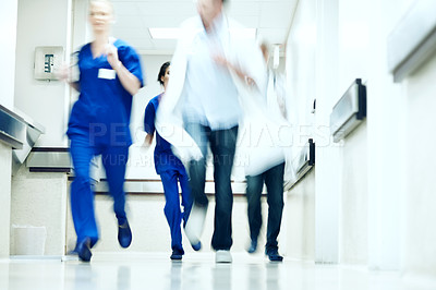 Buy stock photo Running, team and feet of doctors in hospital for emergency,  motion blur and medical crisis. Accident, healthcare rush and wellness with people in clinic for support, urgency and code blue alert