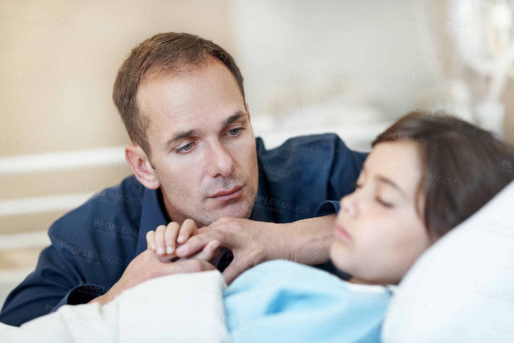 Buy stock photo Worried, father and holding hands in hospital with sick child, support and hope for virus recovery. Sad, man and daughter sleeping in medical clinic with disease, fear and concern for rehabilitation.