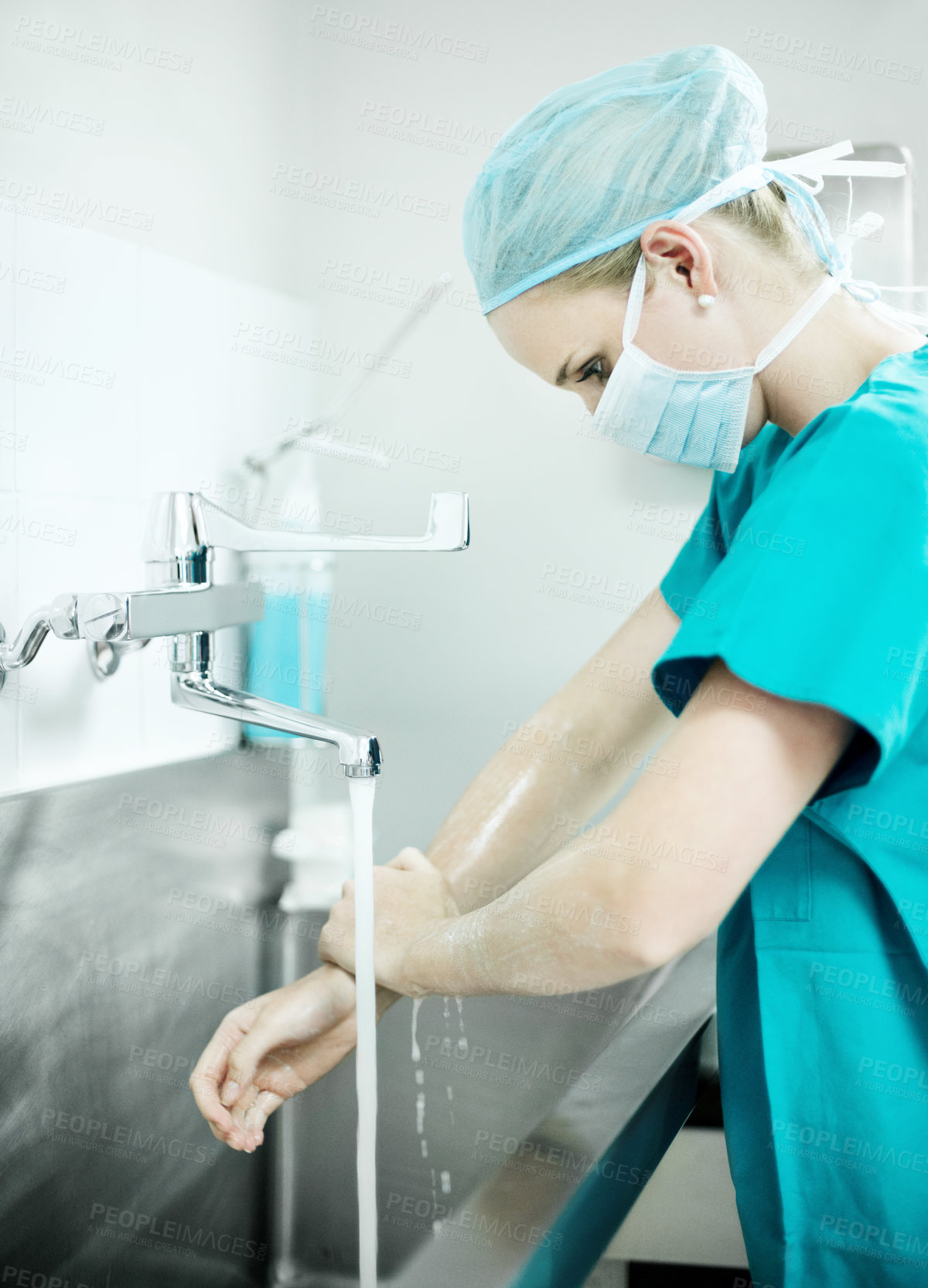 Buy stock photo Woman, hygiene and surgeon washing hands in hospital for theater preparation, safety or surgery. Cleaning, healthcare and doctor with surgical scrub for clinical practice, health or sterile procedure
