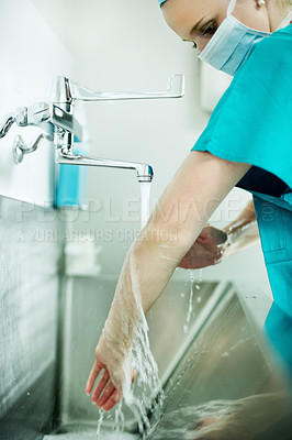 Buy stock photo Woman, hygiene and surgeon washing hands in sink for theater preparation, surgery and disinfection. Medical, doctor and surgical scrub in hospital for infection control, safety and sterile procedure