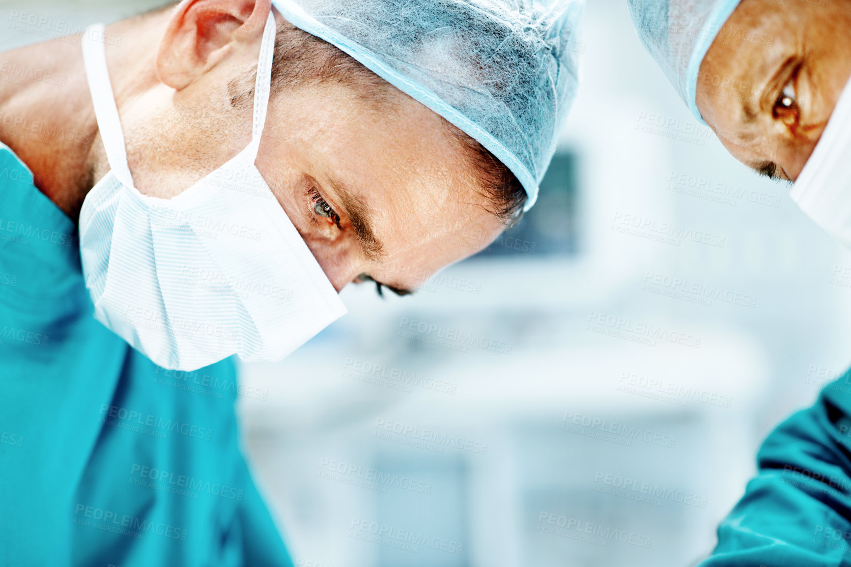 Buy stock photo Surgery, medical and help with man in operating room for transplant emergency, team or rescue. Healthcare, accident or procedure with doctor in theater of hospital for organ graft and surgeon