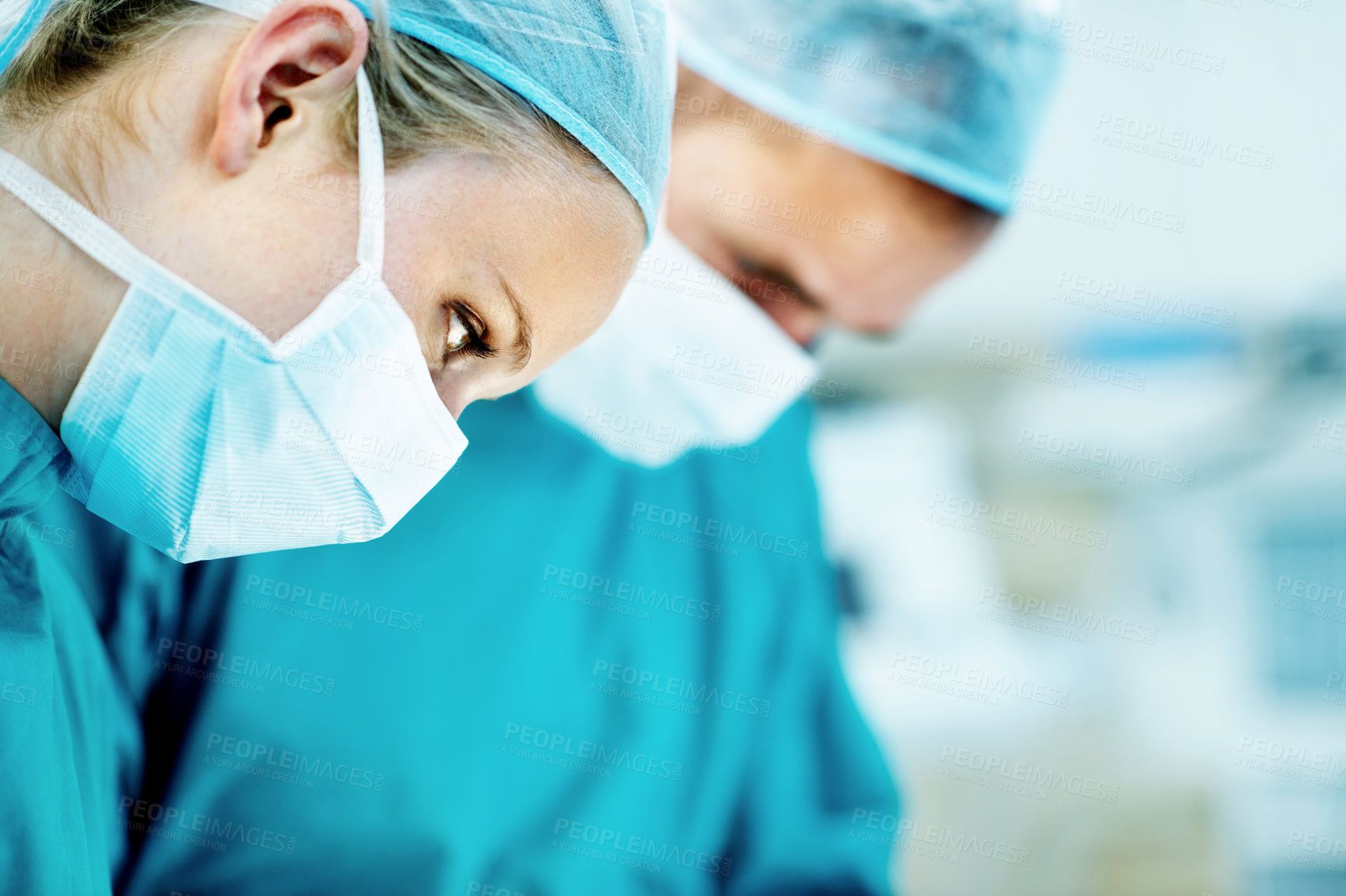 Buy stock photo Surgery, help and team with woman in operating room for transplant emergency, medical or rescue. Healthcare, accident or procedure with doctor in theater of hospital for organ graft and surgeon