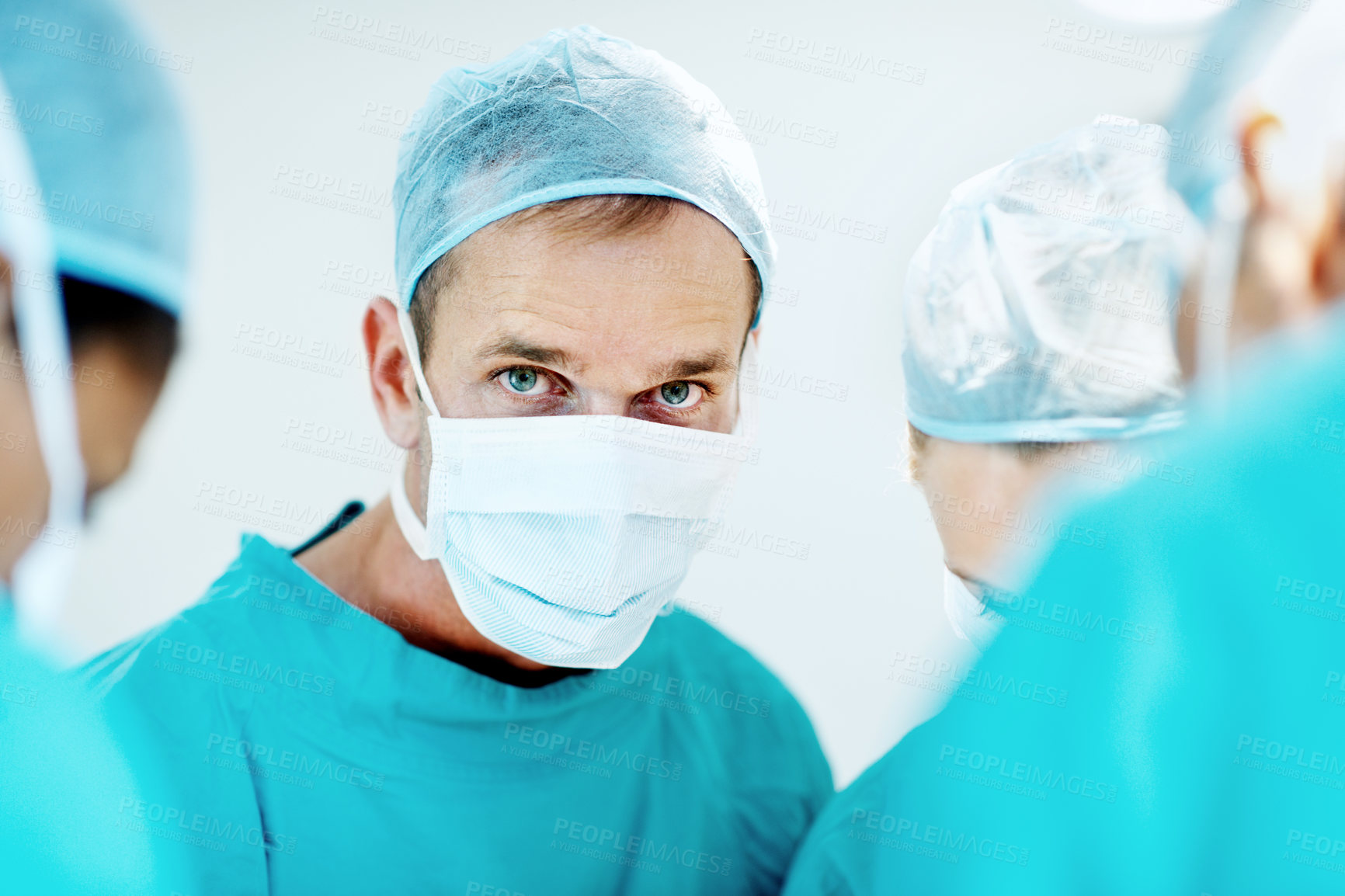 Buy stock photo Surgery, team and portrait with person in operating room for transplant emergency, help or rescue. Healthcare, accident or procedure with doctor in theater of hospital for organ graft and surgeon