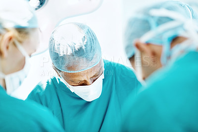Buy stock photo Surgery, help and treatment with doctors in theater at hospital for medical operation, healing or accident. Procedure, healthcare and emergency rescue with team of people in operating room