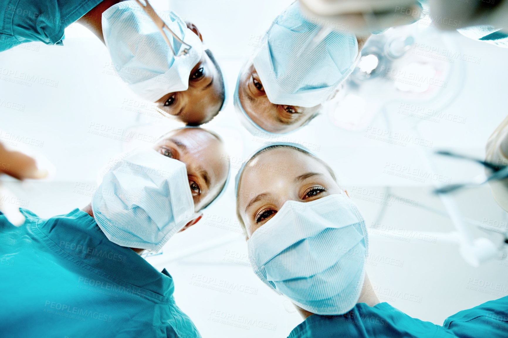 Buy stock photo Surgery, healthcare and portrait of doctors in theater at hospital for medical operation, healing or face mask. Procedure pov, team and emergency rescue with low angle of people in operating room