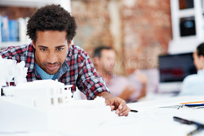 Buy stock photo Building, model and smile with business man in office for real estate, planning or prototype idea. Remodeling proposal, architect and 3d project with employee in coworking agency for process