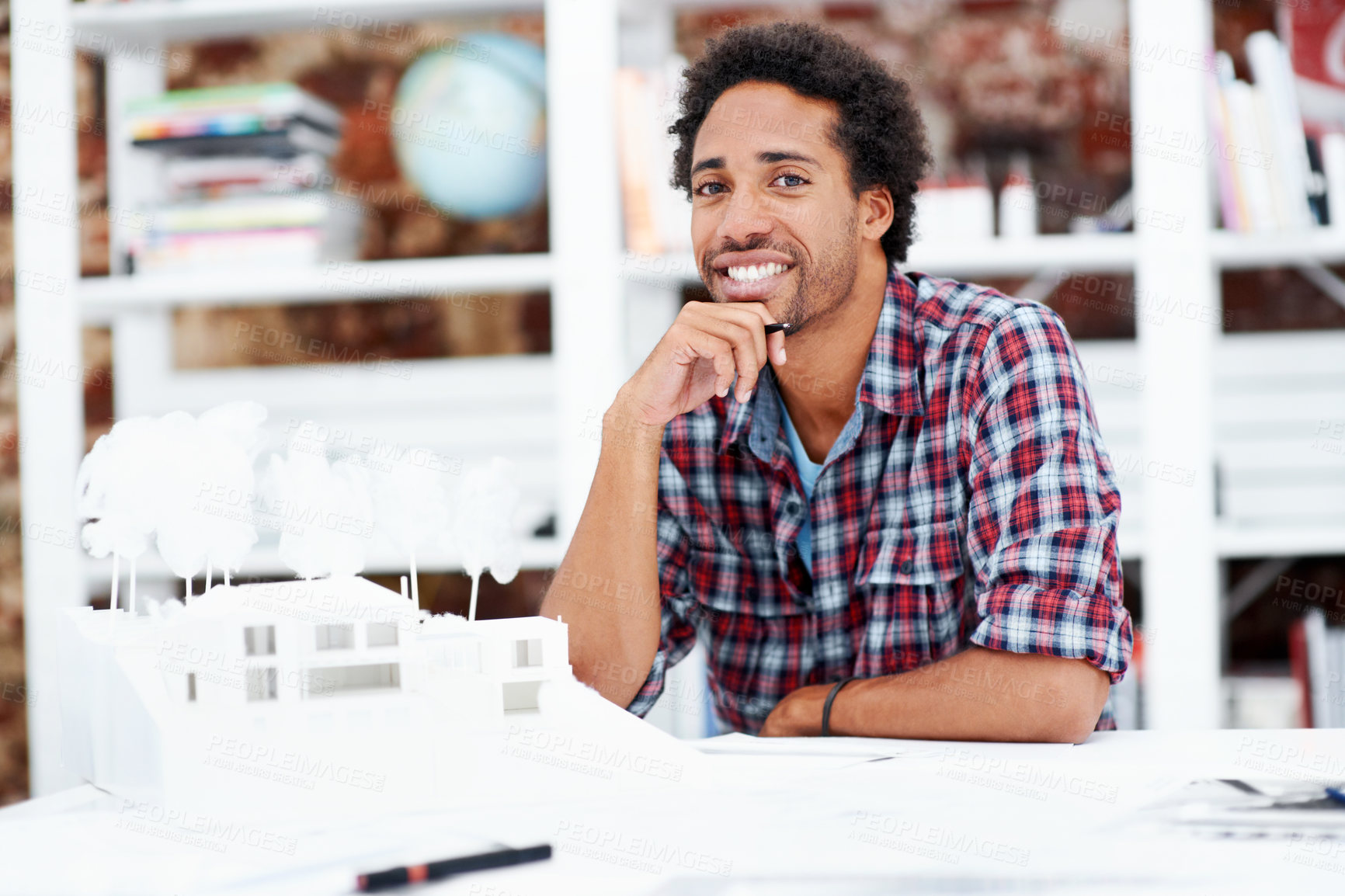 Buy stock photo Property development, portrait or black man in office with model, pride or urban planner in building project. Happy, layout or person with confidence, architect or about us as infrastructure engineer