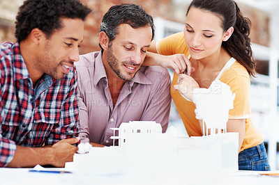 Buy stock photo Team, architecture and people in office with model, building design and prototype for project. Creative, collaboration and workers with 3d structure for planning, blueprint and feedback in meeting