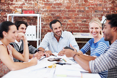 Buy stock photo Meeting, documents and team with business people in office for brainstorming, planning and project budget. Feedback, funding proposal and strategy with employees in startup agency for paperwork