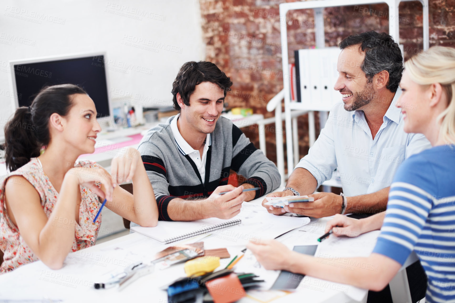 Buy stock photo People, team and discussion with paperwork in office meeting for planning, explain or review at media company. Employee, group and decision with swatch, feedback and collaboration at creative agency