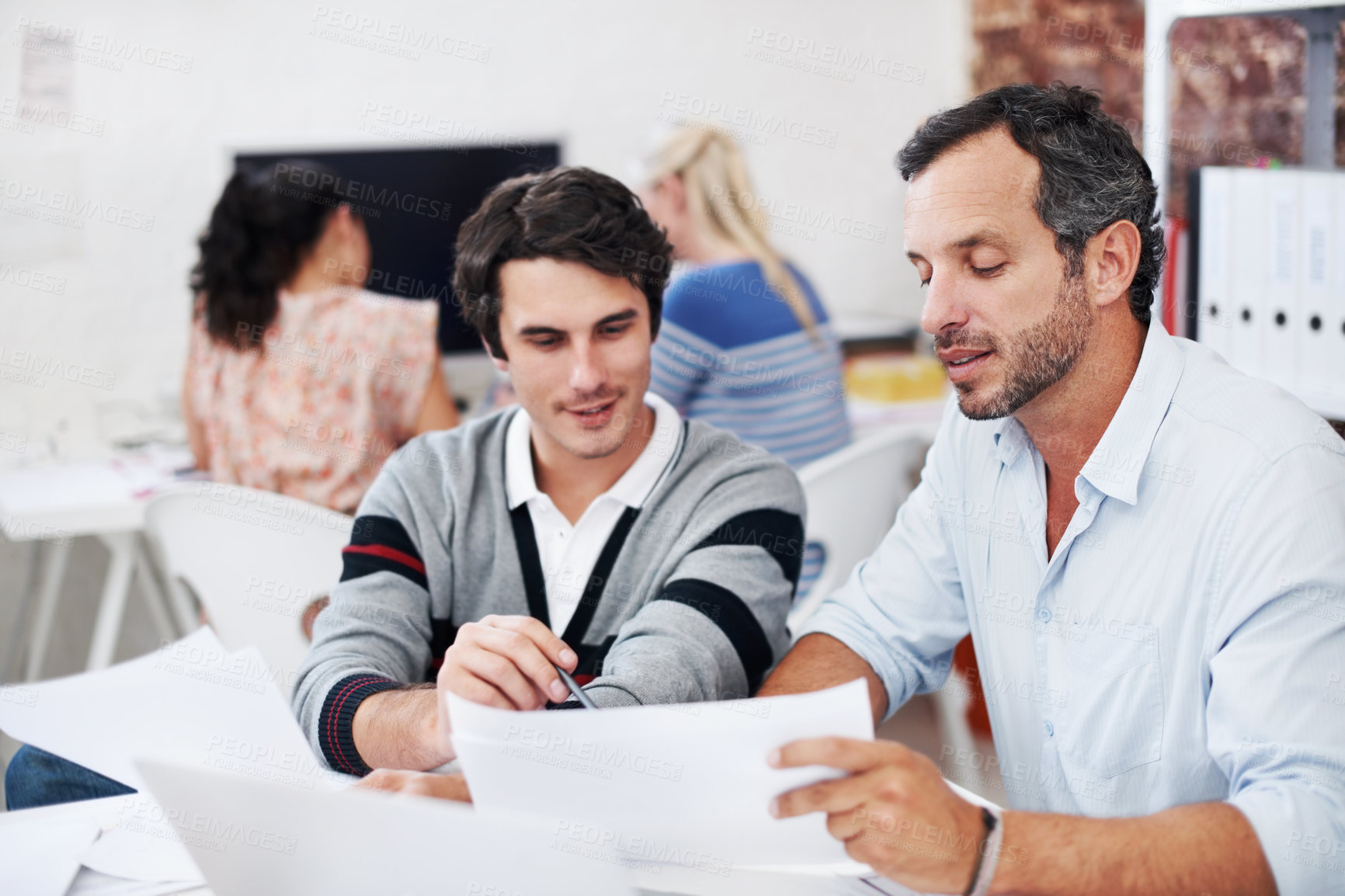 Buy stock photo Team, documents and smile with business people in office for planning, interior design pitch and feedback. Decor paperwork, client briefing and meeting with employees for research and project