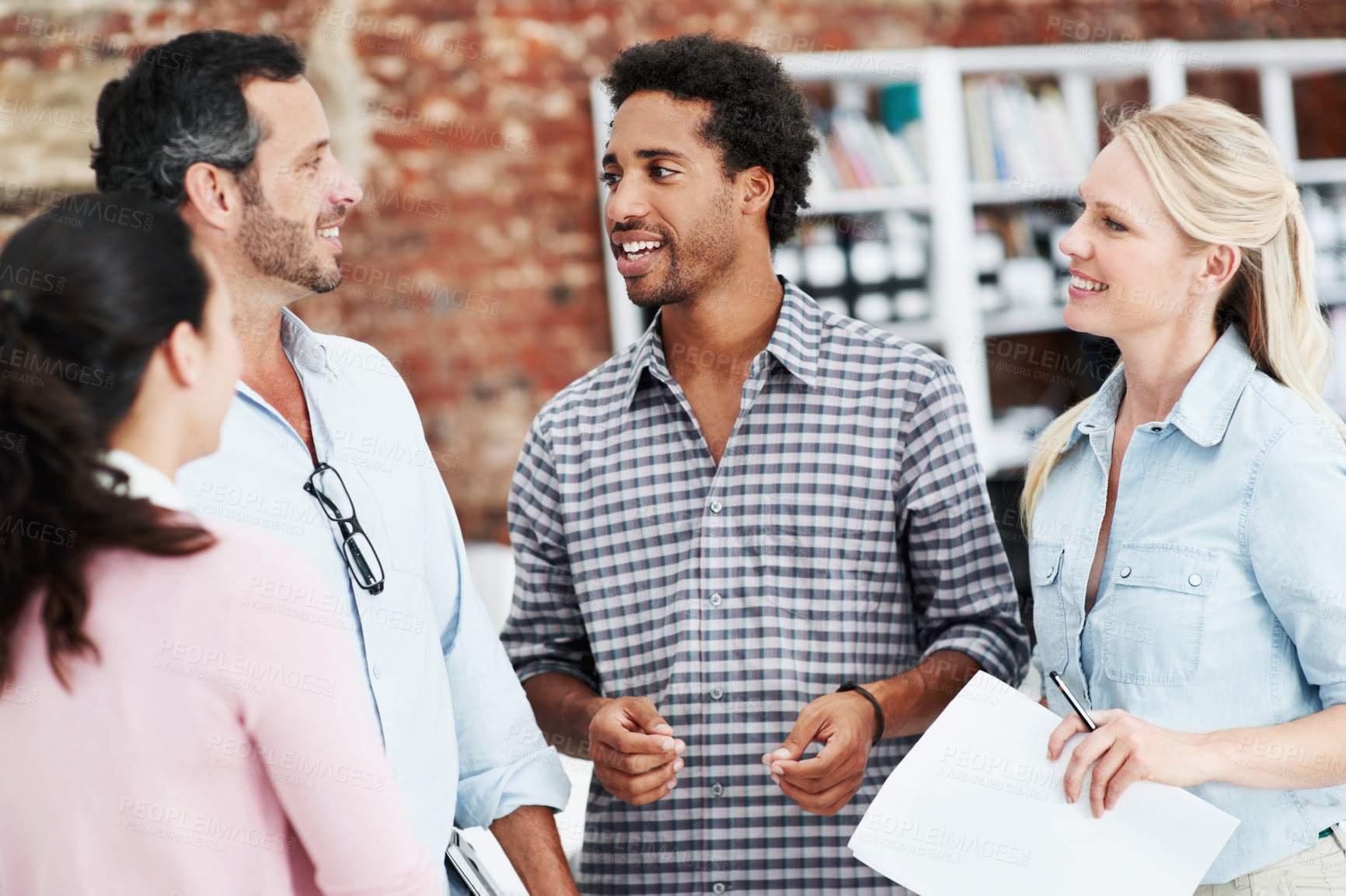 Buy stock photo Meeting, talk and team with business people in office for mentor, design briefing and brainstorming. Creative crit session, manager feedback and collaboration with employees in startup agency