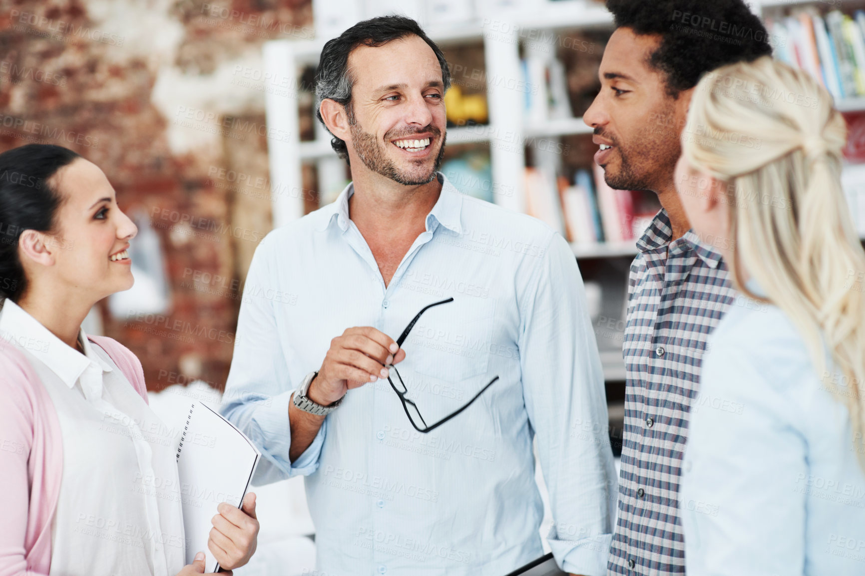 Buy stock photo Meeting, smile and team with business people in office for mentor, design briefing and brainstorming. Creative crit session, manager feedback and collaboration with employees in startup agency