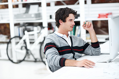 Buy stock photo Reading, computer and research with business man in office for web developer, review and planning. Logo design, creative project and designer with person in startup agency for branding update