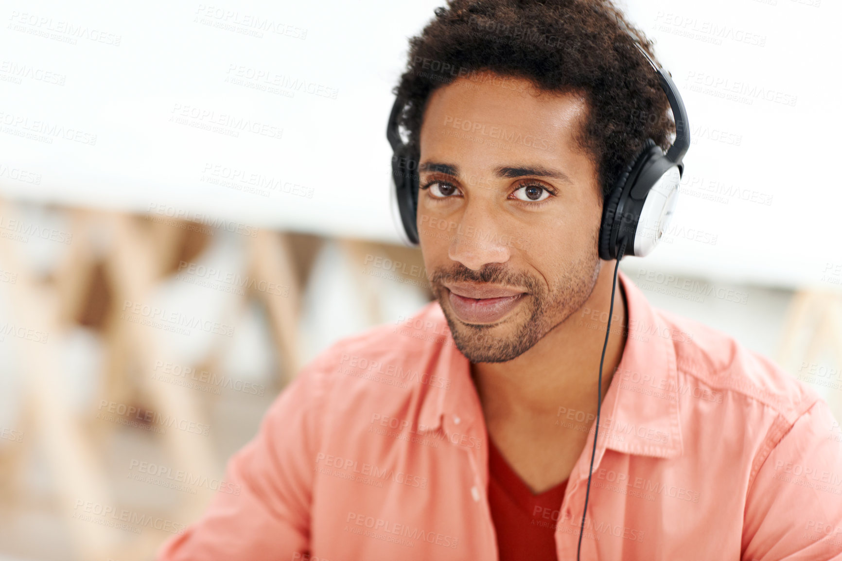 Buy stock photo Smile, headphones and portrait of business black man in office for streaming, music and radio. Audio subscription, professional and sound with employee in media agency for project and startup