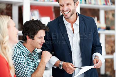 Buy stock photo Mentor, meeting and floor plan with business people in office for idea, property or building proposal. Architecture, blueprint or real estate layout with employees and documents for  design project