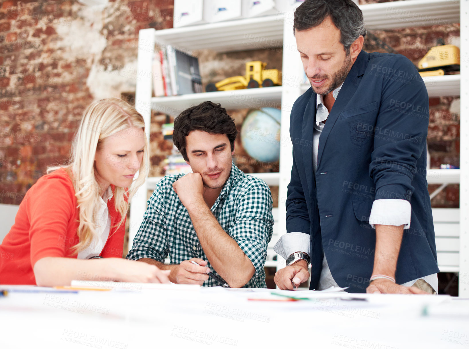 Buy stock photo People, architect and reading in office with documents, blueprint and policy for architecture. Team, meeting or review in workplace with paperwork, floor plan and information for building development