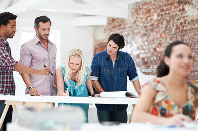 Buy stock photo Creative, architect and team with floor plan in office, discussion and real estate design in meeting. Architecture, designer and people with paperwork, collaboration and property development ideas