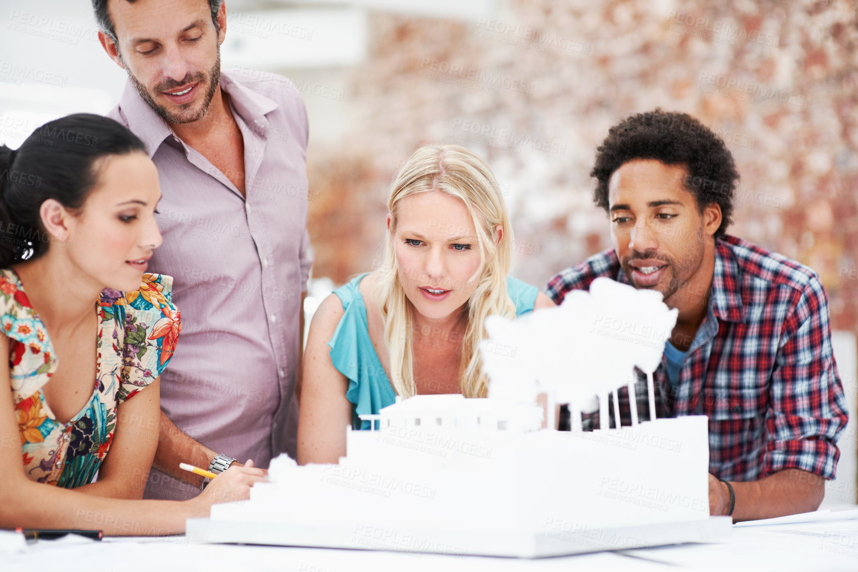 Buy stock photo Property development, review or team in agency with model, collaboration or design project in meeting. Building, people or architects with prototype, site planning or group evaluation of structure.