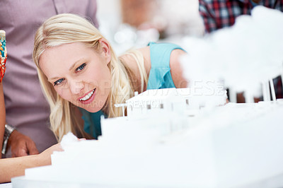 Buy stock photo Creative, architect and happy woman with 3D model in office, real estate and building design review. Urban planning, city designer and person with prototype for housing development and architecture