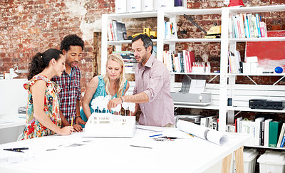 Buy stock photo Team, architects and discussion with model in office, real estate design or building planning. Startup, people and construction prototype in meeting, creative engineering and property development