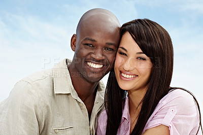 Buy stock photo Portrait of an affectionate couple enjoying a day outside together