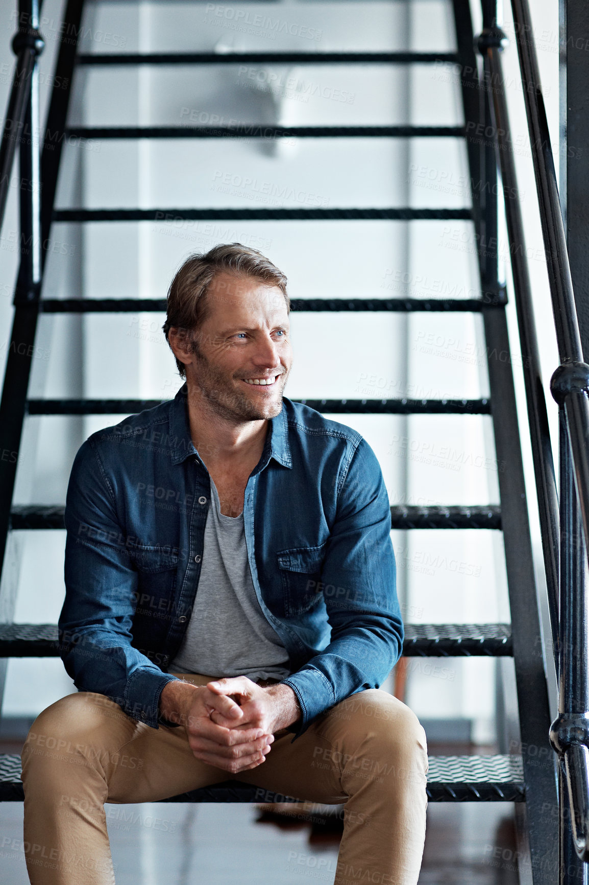 Buy stock photo Smile, stairs and thinking with man in home for perspective, reflection and mindfulness on weekend break. Mature, vision and planning with male person on steps in house for memory and inspiration