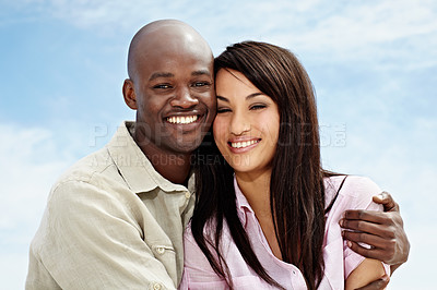 Buy stock photo Portrait of an affectionate couple enjoying a day outside together