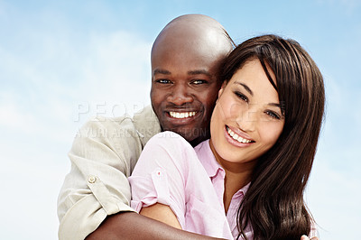 Buy stock photo Portrait of an affectionate couple enjoying a day outside together