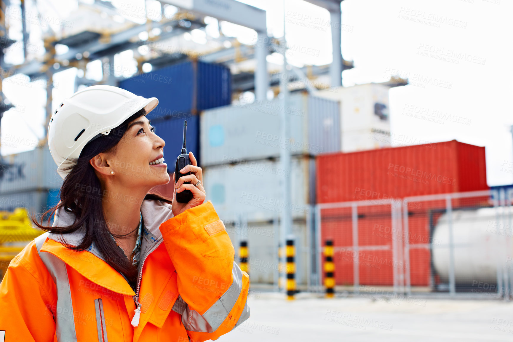 Buy stock photo Logistics, discussion or woman on dock with radio, inventory control or site operations in chat. PPE, freight or coordinator in yard with tech, shipment track or dispatch instruction in communication