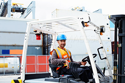 Buy stock photo Portrait of a forklift operator working on a large commercial dock