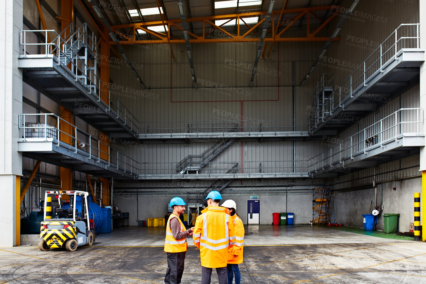 Buy stock photo Logistics, people and meeting in warehouse for quality control, management or shipping discussion. Freight, operations manager and team in workshop with engineer, inspection and safety compliance
