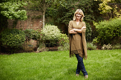 Buy stock photo Portrait of a mature woman standing outside