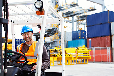 Buy stock photo Portrait of a forklift operator working on a large commercial dock