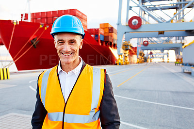 Buy stock photo Portrait of a mature man in workwear standing outside on a large commercial dock