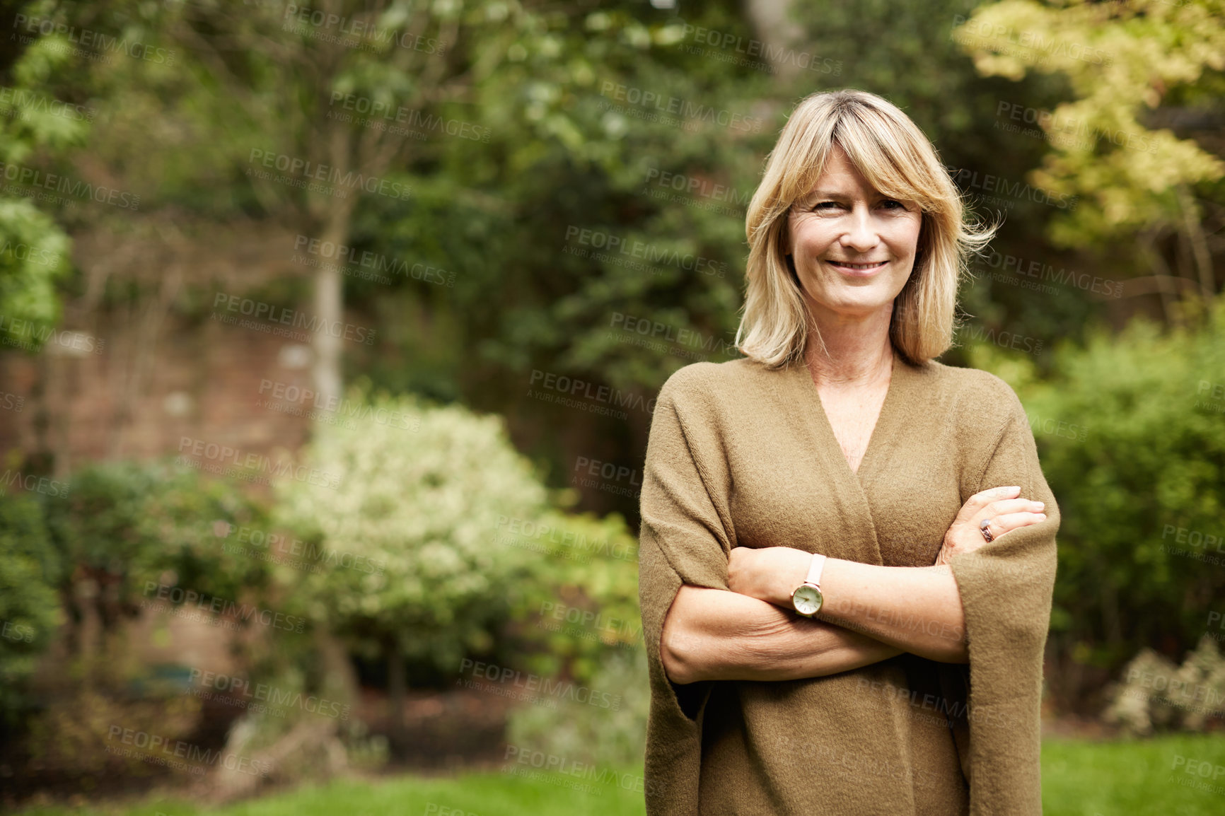 Buy stock photo Portrait of a mature woman standing outside