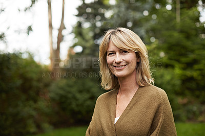 Buy stock photo Portrait of a mature woman standing outside