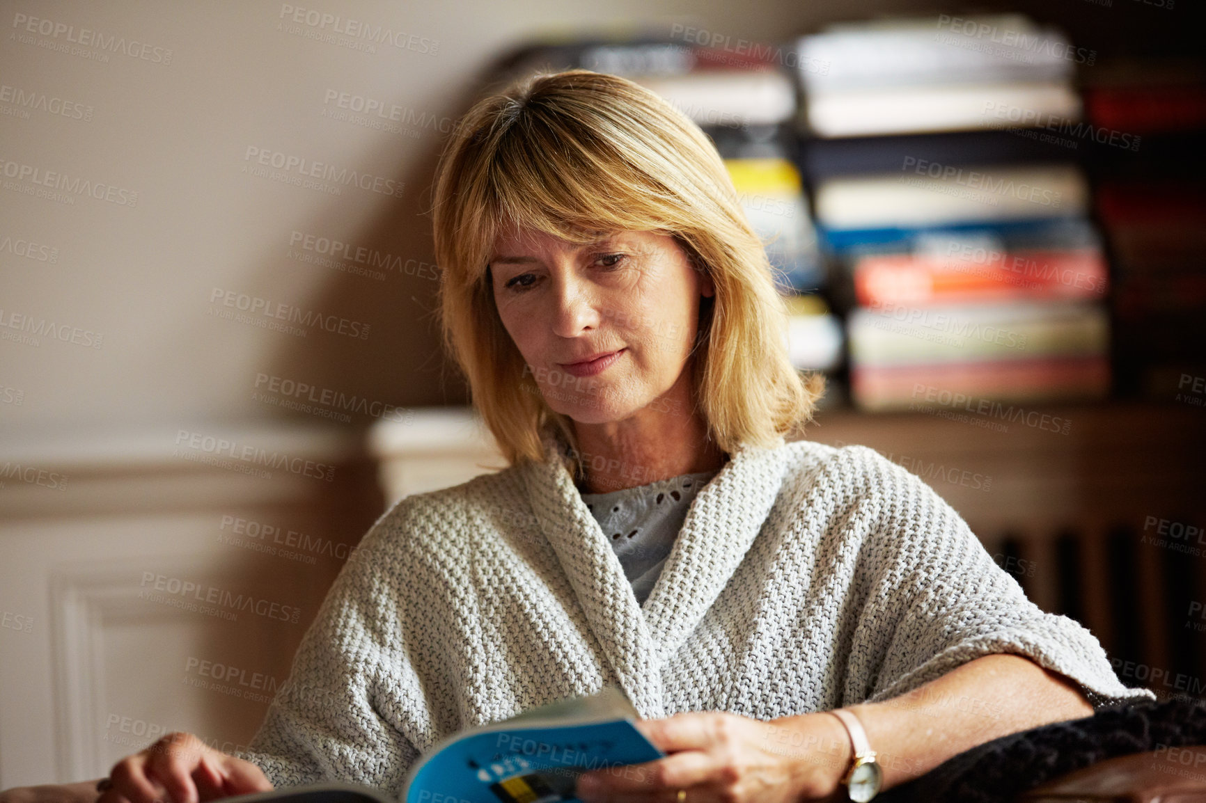 Buy stock photo Relax, woman and reading book in house for story, learning and development information with peace. Mature person, literature and study in home, guidebook and self improvement hobby on weekend break