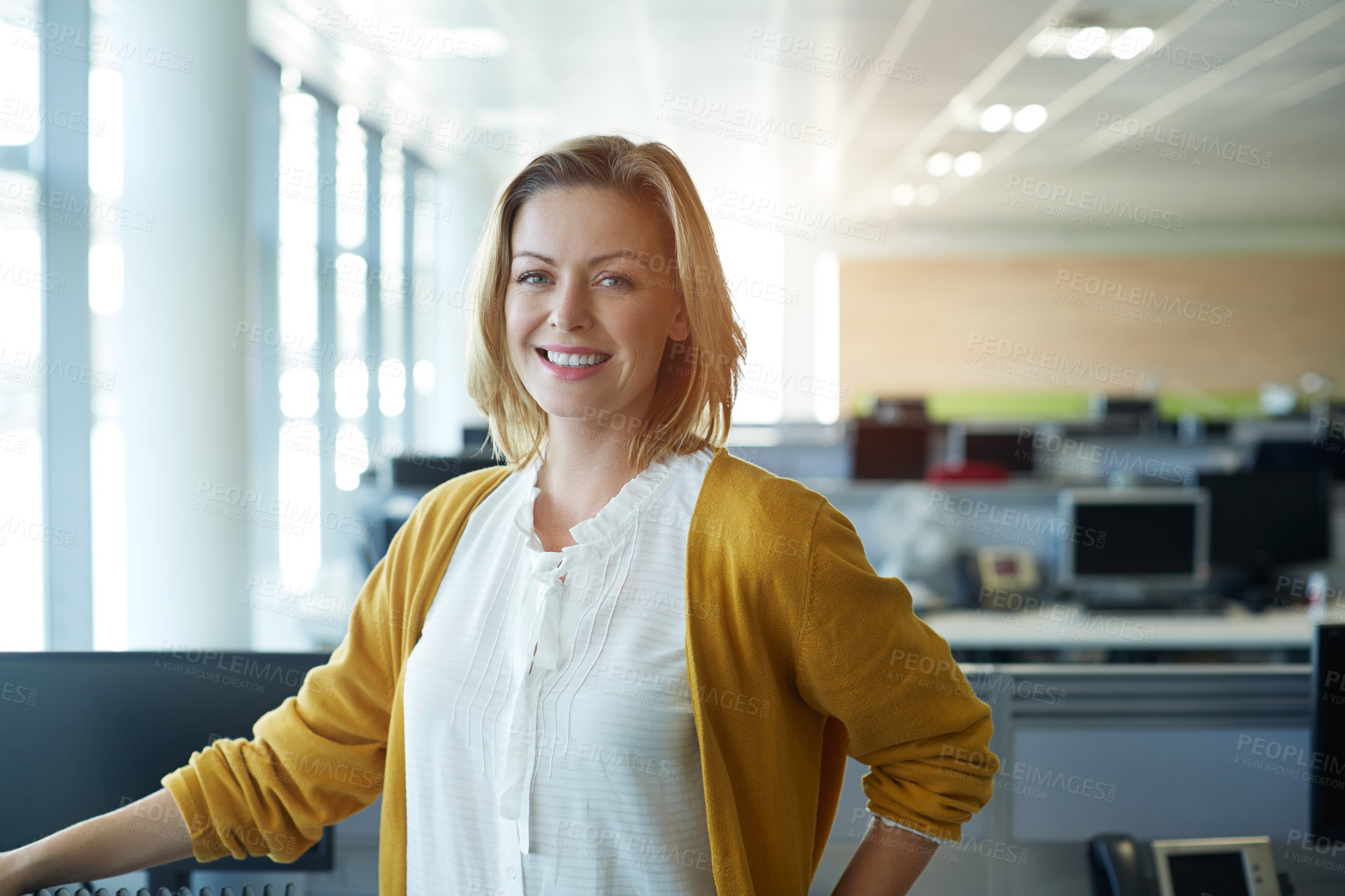 Buy stock photo Portrait of a smiling woman standing in an office