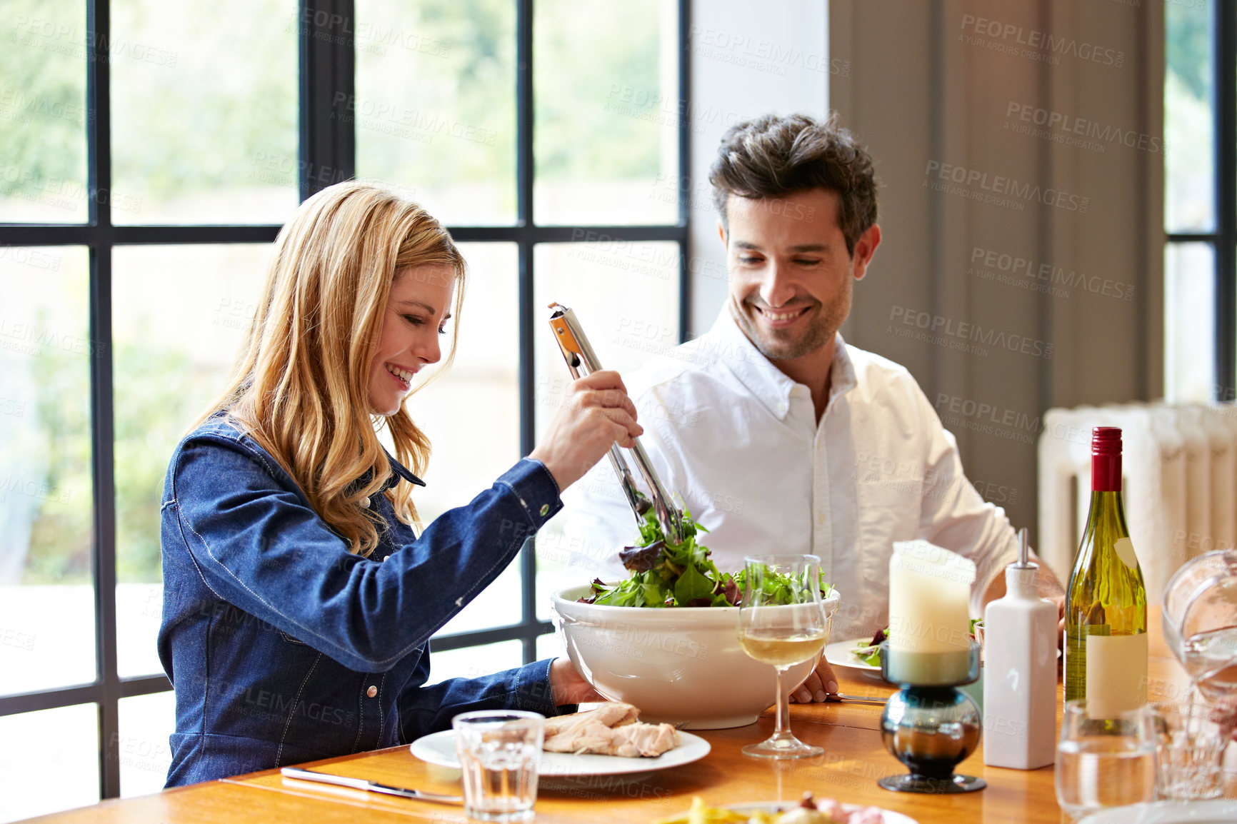 Buy stock photo Home, happy and couple with salad for lunch, dinner and share meal together for wellness. Wine, house and man with woman for talking, bonding and dish for healthy food, vegetables and nutrition 