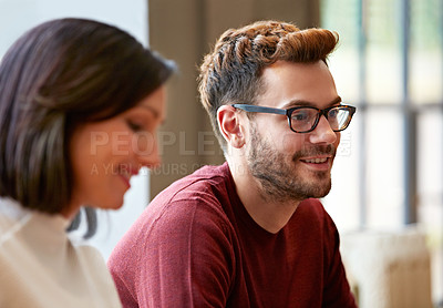 Buy stock photo Shot of a smiling young couple at home