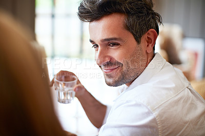 Buy stock photo Shot of a two people talking together at the dinner table